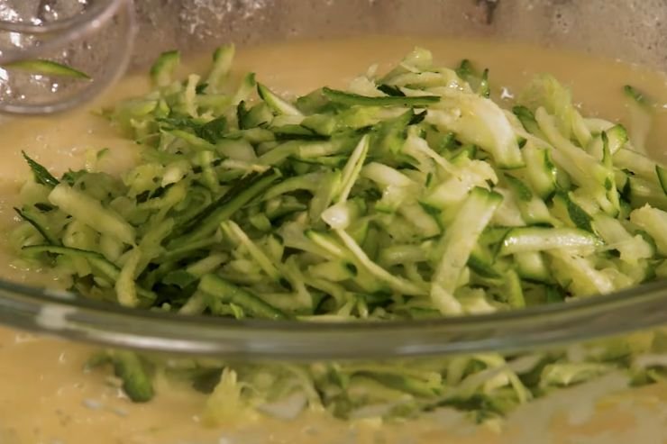 Fold in the zucchini and orange zest