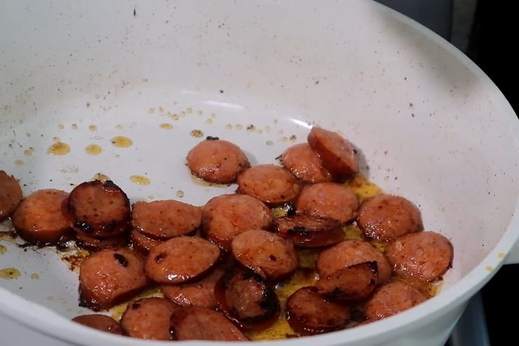 Brown the beef sausage
